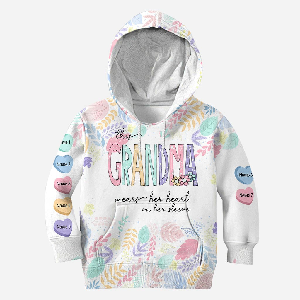 This Grandma Wears Her Heart On Her Sleeve - Personalized Grandma All Over T-shirt And Hoodie